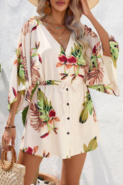 Resort-style printed batwing sleeve tie-up jumpsuit