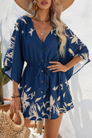 Resort-style printed batwing sleeve tie-up jumpsuit