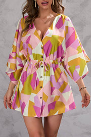 Resort-style printed batwing sleeve tie-up jumpsuit